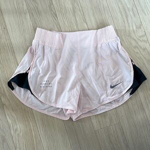 Nike Running Division pink shorts